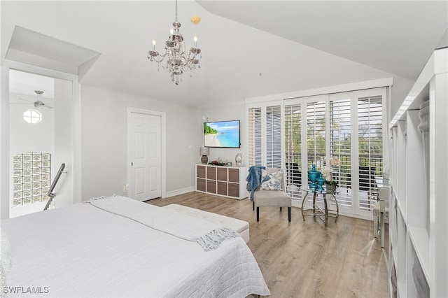 bedroom featuring an inviting chandelier and light wood-type flooring