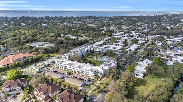 drone / aerial view with a water view