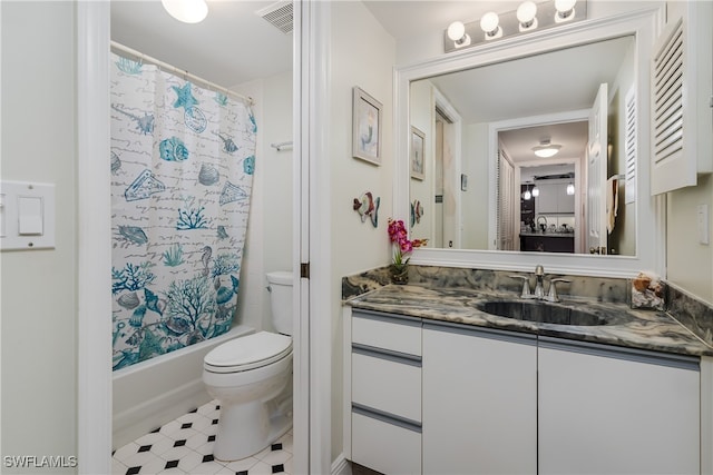 full bathroom with shower / bath combo with shower curtain, vanity, and toilet