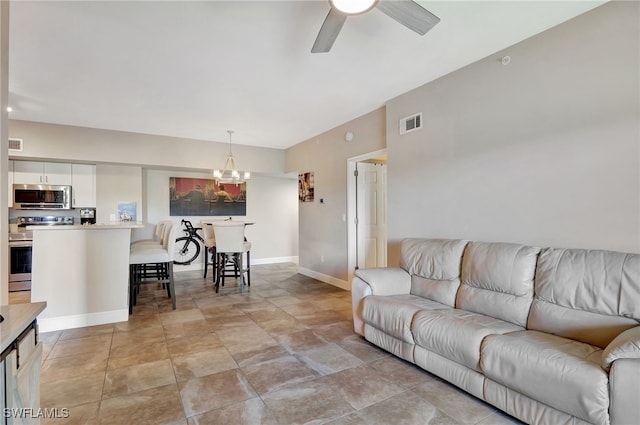 1830 Florida Club Cir Unit 4310, Naples, FL 34112 - living area featuring a chandelier and ceiling fan