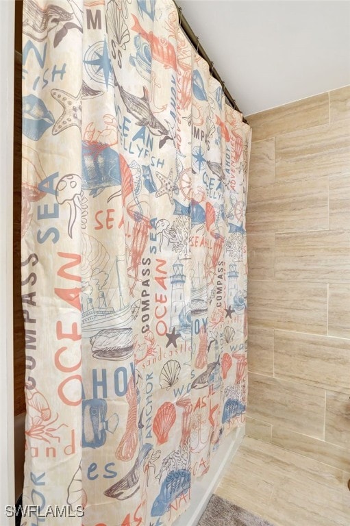 1830 Florida Club Cir Unit 4310, Naples, FL 34112 - bathroom featuring curtained shower
