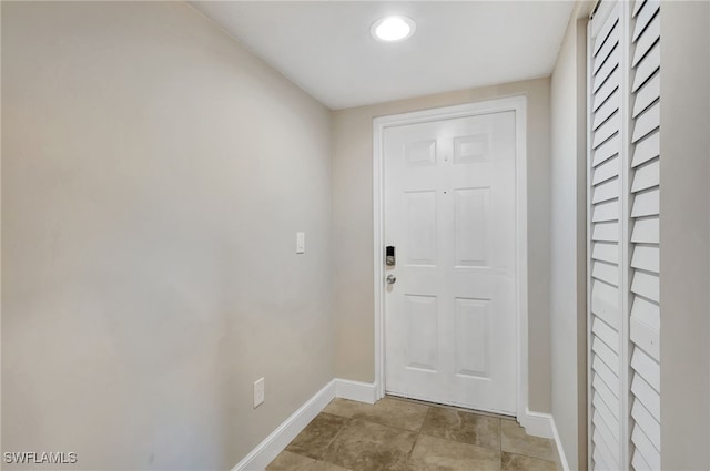 doorway with baseboards