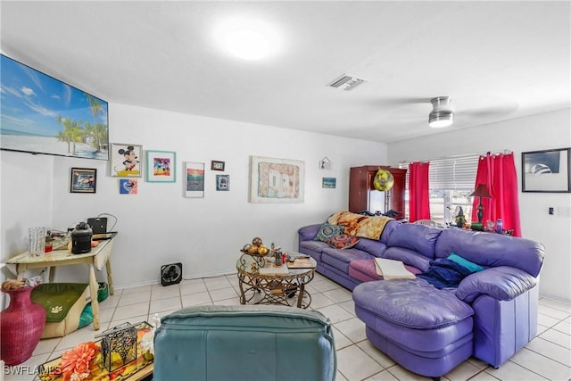 tiled living room featuring ceiling fan