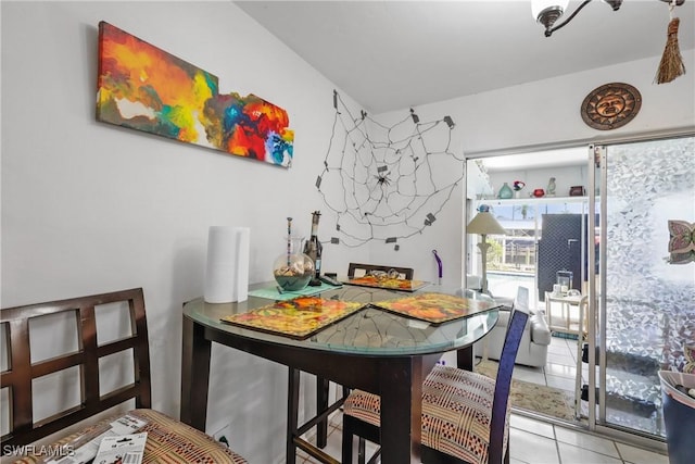 dining space with light tile patterned floors