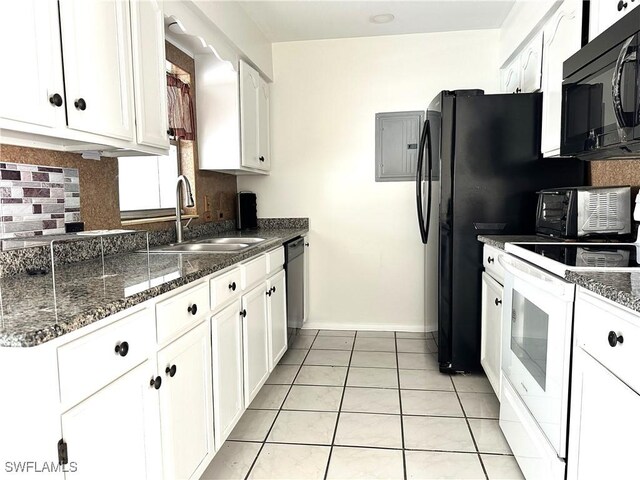 kitchen with light tile patterned floors, sink, white cabinetry, and black appliances