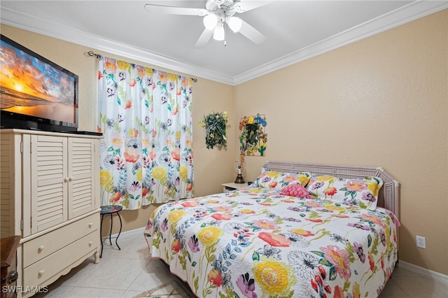 tiled bedroom with ceiling fan and crown molding