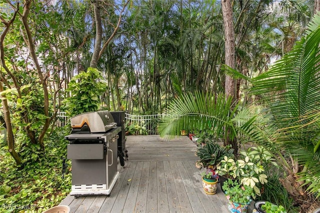 7452 Berkshire Pines Dr, Naples, FL 34104 - wooden terrace featuring a grill