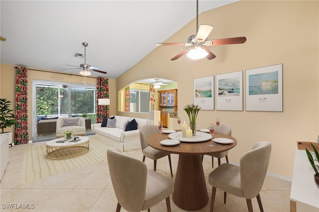 7452 Berkshire Pines Dr, Naples, FL 34104 - dining area featuring ceiling fan, light tile patterned flooring, and high vaulted ceiling