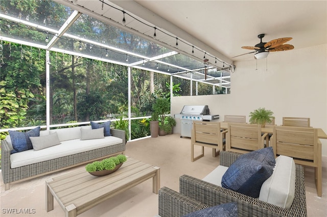 7452 Berkshire Pines Dr, Naples, FL 34104 - sunroom with an outdoor living space, a ceiling fan, and outdoor dining space
