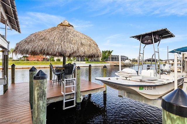 view of dock with a water view