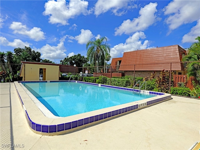 community pool with fence