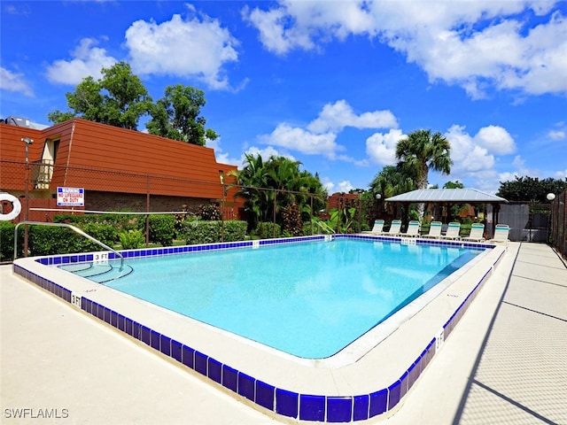 community pool with fence