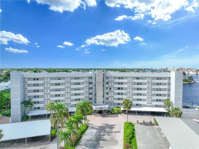 view of property with a water view