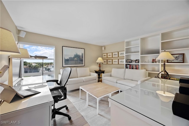 home office featuring light hardwood / wood-style floors