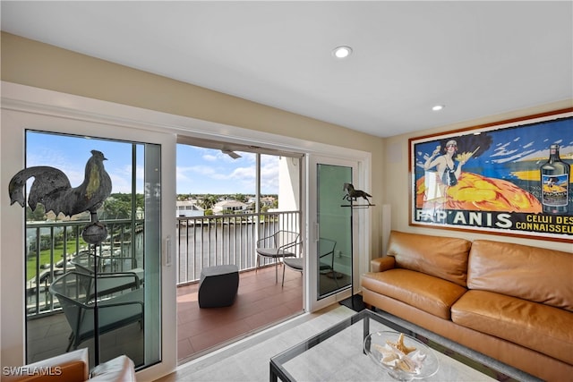 living room featuring a water view