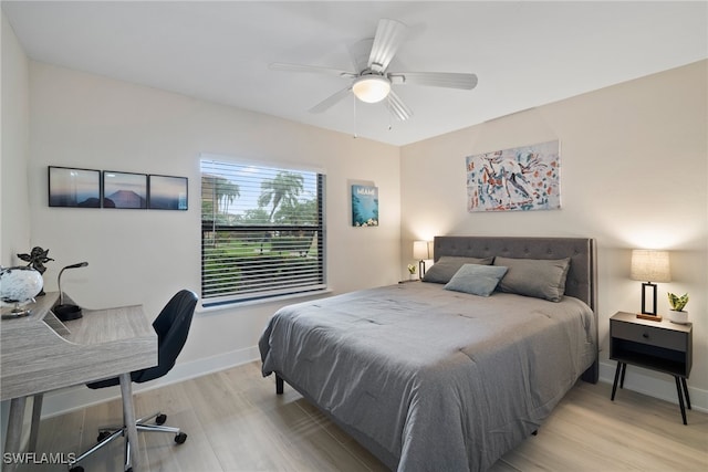 bedroom featuring ceiling fan and light wood-type flooring