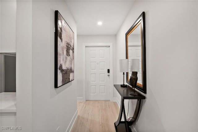 12170 Kelly Sands Way Unit 702, Fort Myers, FL 33908 - hall featuring baseboards, light wood-style flooring, and recessed lighting