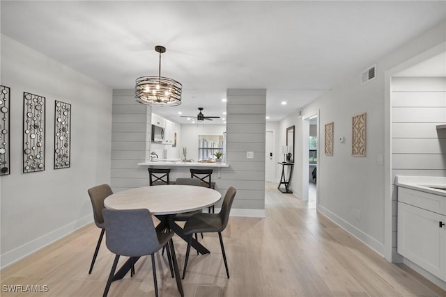 12170 Kelly Sands Way Unit 702, Fort Myers, FL 33908 - dining room featuring ceiling fan, recessed lighting, baseboards, and light wood-type flooring
