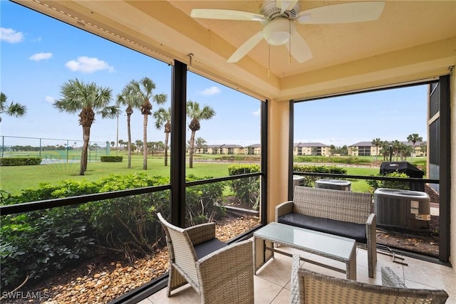 12170 Kelly Sands Way Unit 702, Fort Myers, FL 33908 - sunroom / solarium with a ceiling fan and plenty of natural light