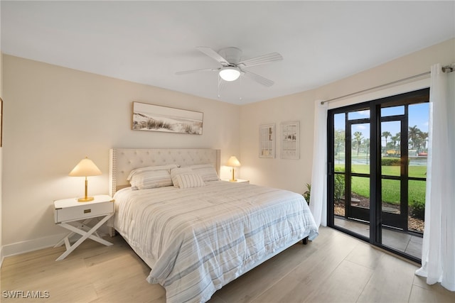 bedroom featuring wood-type flooring, ceiling fan, and access to exterior