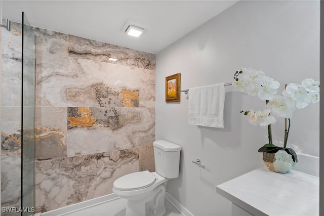 bathroom with toilet and tile patterned flooring