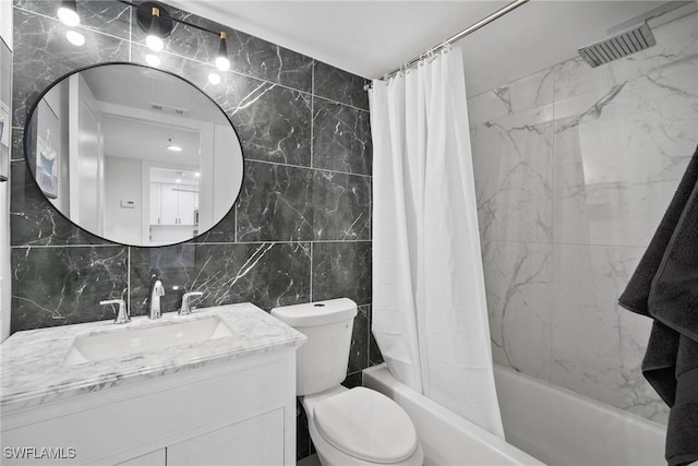 12540 Kelly Greens Blvd Unit 327, Fort Myers, FL 33908 - bathroom with tile walls, shower / bathtub combination with curtain, vanity, toilet, and backsplash