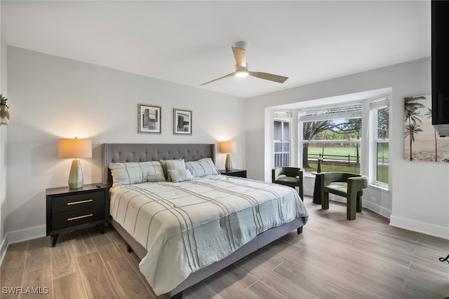 bedroom featuring ceiling fan and wood-type flooring