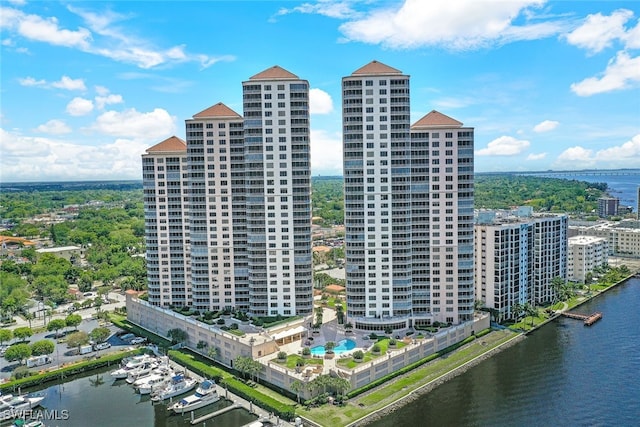 birds eye view of property with a water view