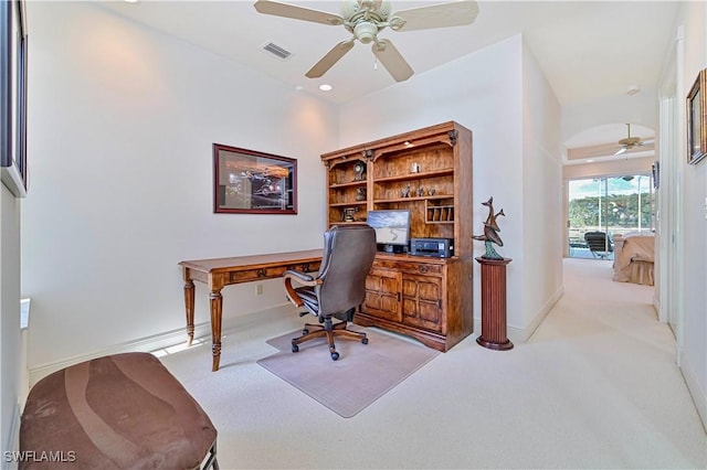 office with ceiling fan and light colored carpet