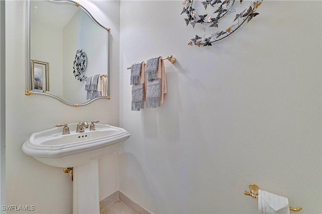 bathroom featuring tile patterned flooring