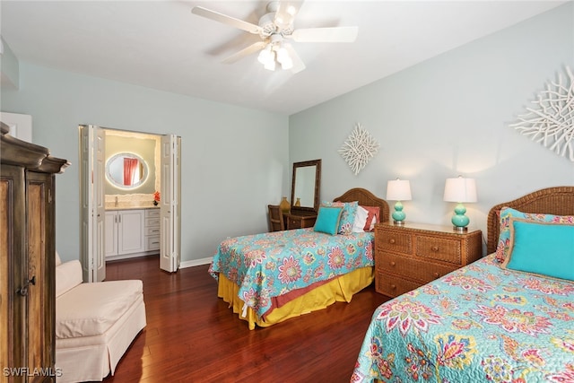 bedroom with ensuite bathroom, ceiling fan, and dark hardwood / wood-style floors