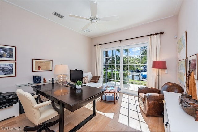 office with ceiling fan and light wood-type flooring