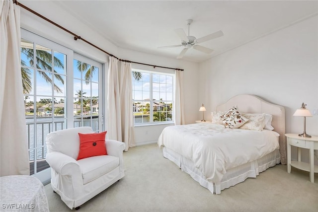 1627 Barbados Ct, Marco Island, FL 34145 - bedroom with carpet floors, a water view, and a ceiling fan