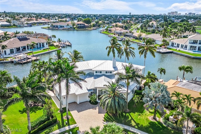 drone / aerial view with a water view