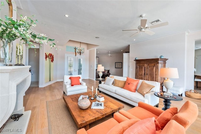 1627 Barbados Ct, Marco Island, FL 34145 - living room featuring light wood-type flooring, ceiling fan, french doors, and recessed lighting