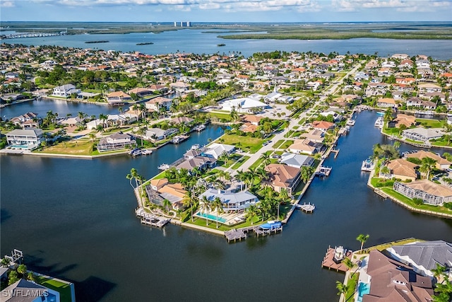 bird's eye view with a water view