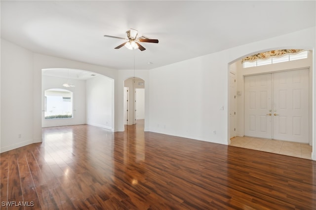 interior space featuring ceiling fan and hardwood / wood-style flooring