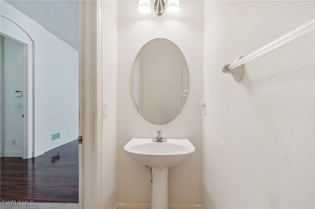 bathroom featuring hardwood / wood-style flooring