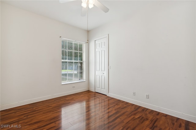 spare room featuring hardwood / wood-style flooring and ceiling fan