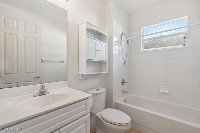 full bathroom featuring vanity, toilet, and tiled shower / bath