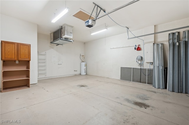 garage with electric water heater and a garage door opener