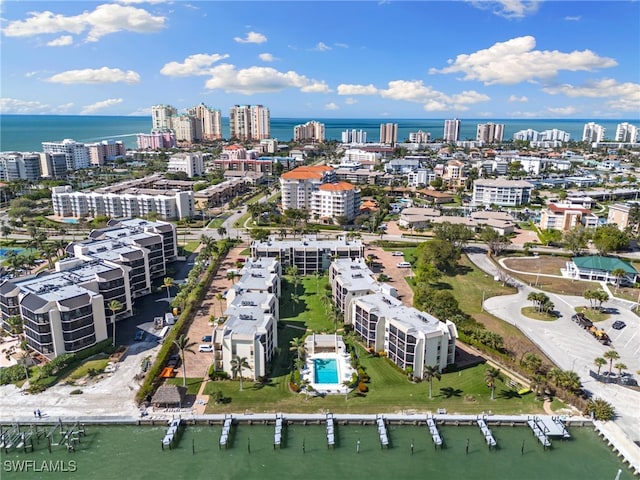 drone / aerial view with a water view