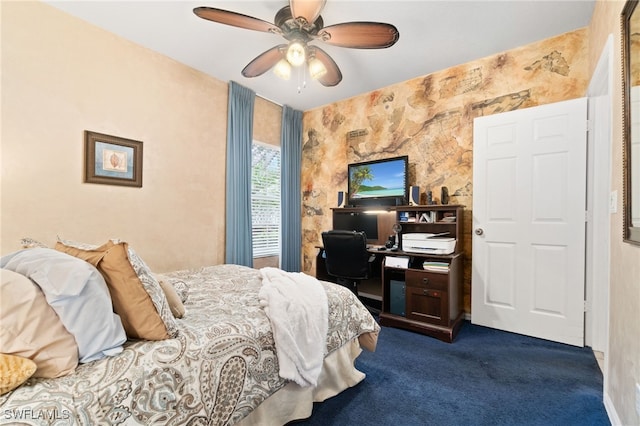 bedroom with dark carpet and ceiling fan