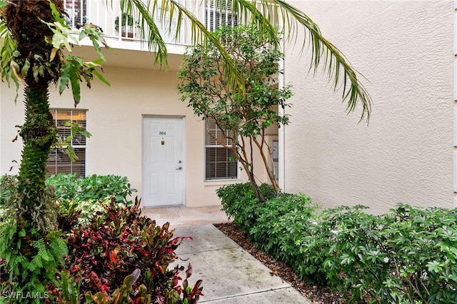 doorway to property with a balcony