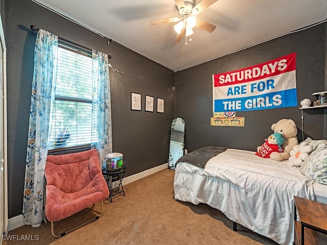 carpeted bedroom featuring ceiling fan