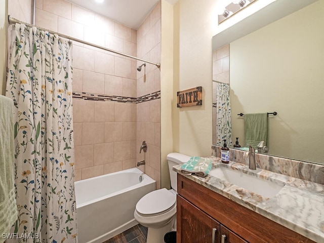 full bathroom with vanity, toilet, and shower / tub combo