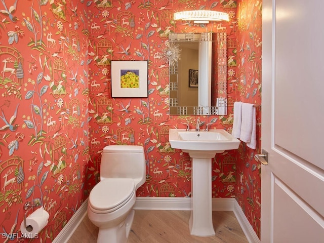 4800 Pelican Colony Blvd Unit 803, Bonita Springs, FL 34134 - bathroom with wallpapered walls and wood finished floors