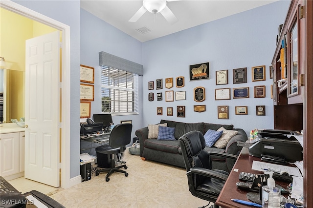 home office featuring ceiling fan and light tile patterned flooring