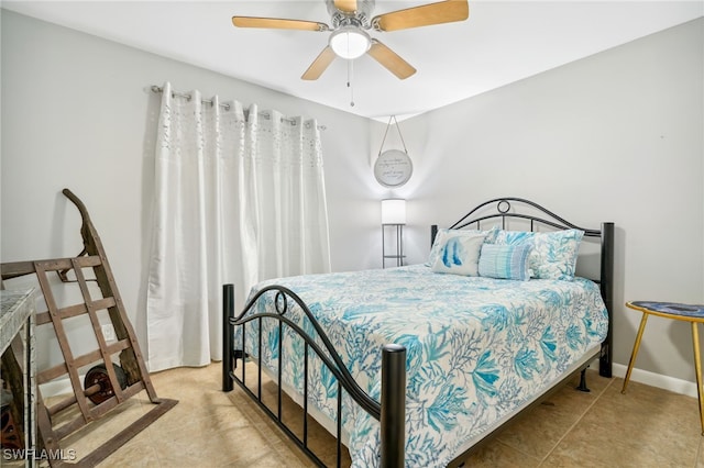 bedroom featuring ceiling fan and light tile patterned flooring