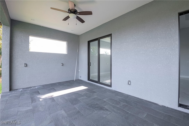 spare room with ceiling fan